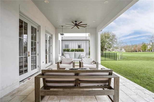 view of patio / terrace with french doors, ceiling fan, and an outdoor hangout area