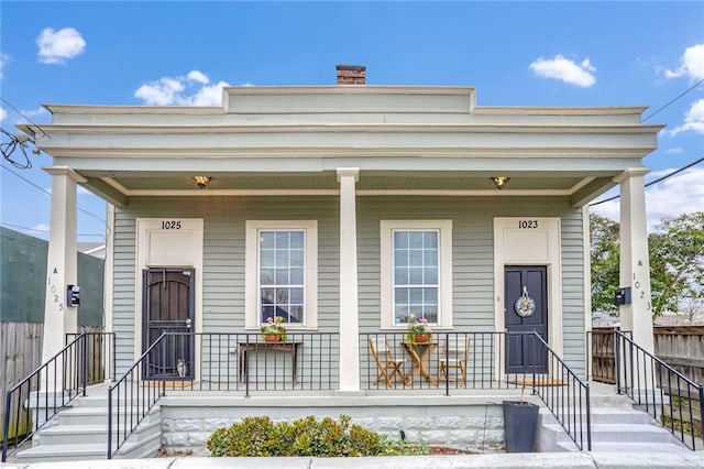 view of front facade with covered porch