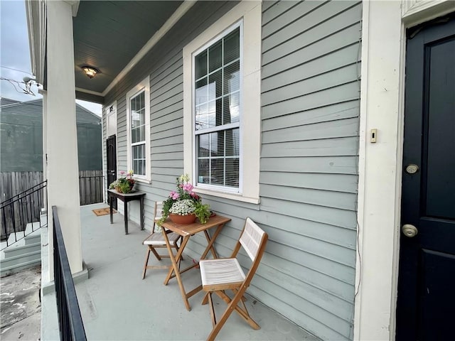 balcony featuring covered porch