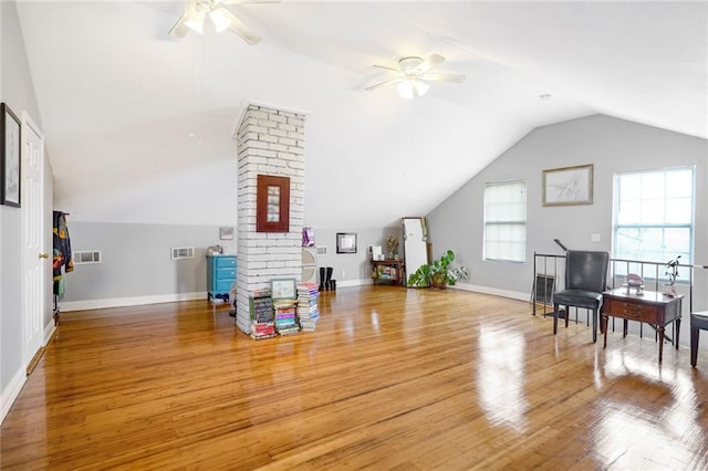 interior space with lofted ceiling, light hardwood / wood-style flooring, and ceiling fan