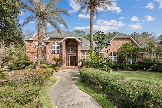 view of front facade with a front yard