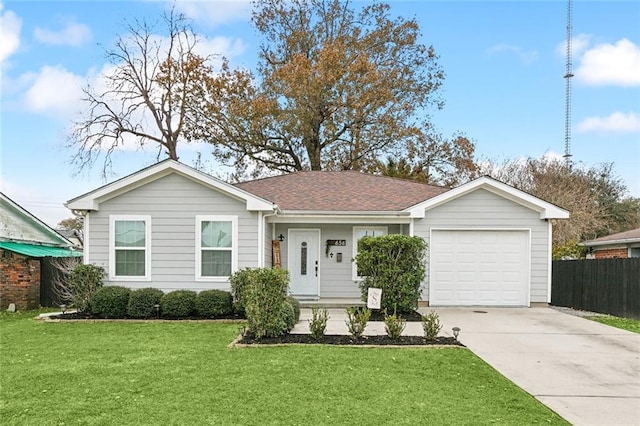 ranch-style home featuring a garage and a front lawn