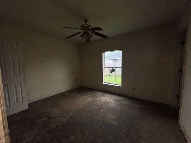 unfurnished room with ceiling fan