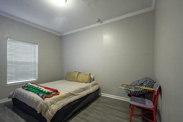 bedroom featuring ornamental molding and dark wood-type flooring