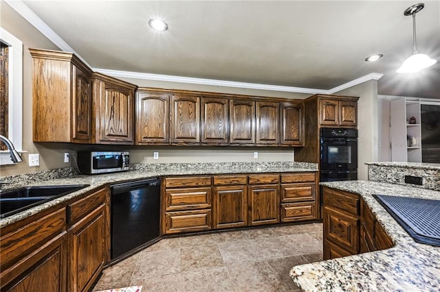 kitchen with light stone counters, sink, ornamental molding, and black appliances