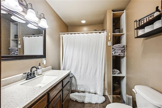 12119 Acey Allen Rd, Independence, LA 70443 - bathroom with a shower with curtain, vanity, toilet, and tile patterned floors
