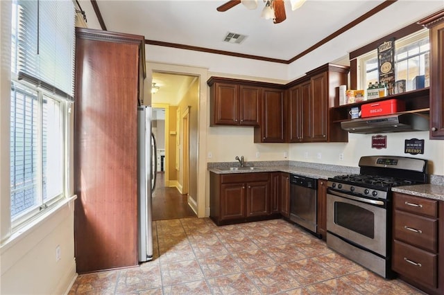 kitchen with sink, appliances with stainless steel finishes, dark brown cabinetry, ornamental molding, and light stone countertops