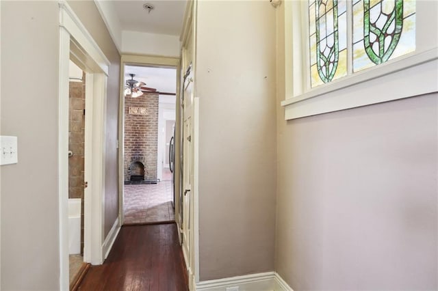 hall featuring dark hardwood / wood-style floors