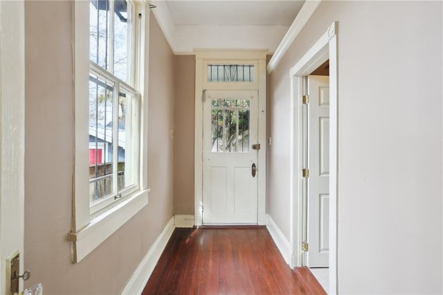 doorway to outside featuring dark hardwood / wood-style floors