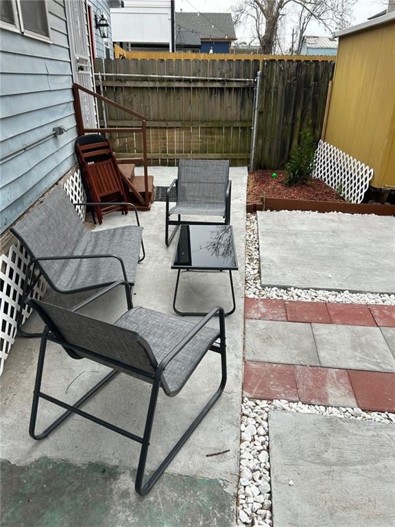 view of patio with fence