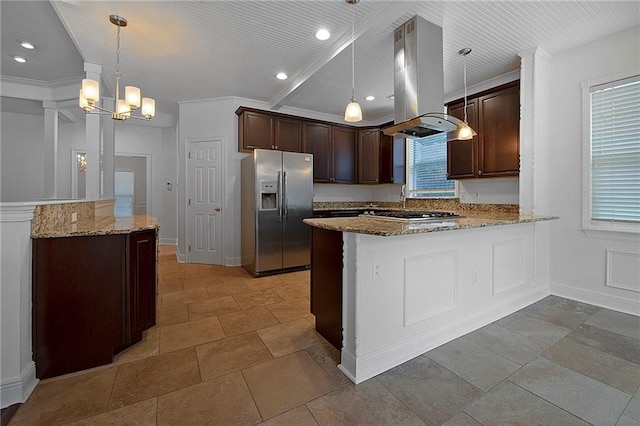 kitchen featuring appliances with stainless steel finishes, a peninsula, light stone countertops, island exhaust hood, and pendant lighting