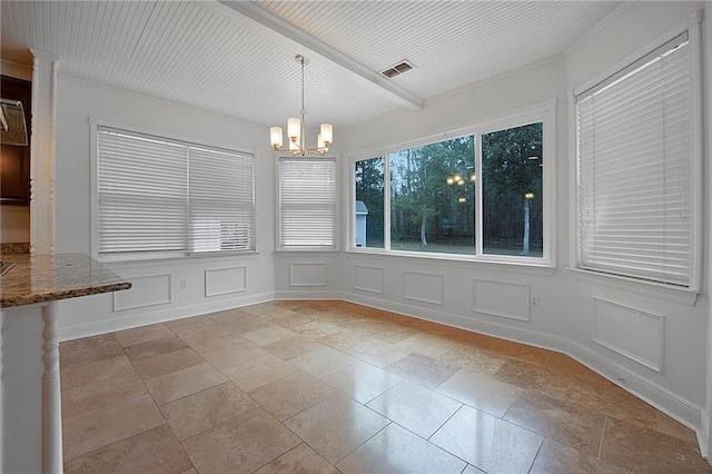 unfurnished dining area with beamed ceiling, an inviting chandelier, visible vents, and a decorative wall