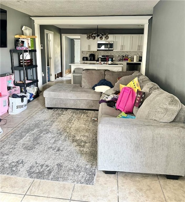 living room with a textured ceiling