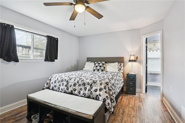 bedroom featuring dark hardwood / wood-style floors and ceiling fan