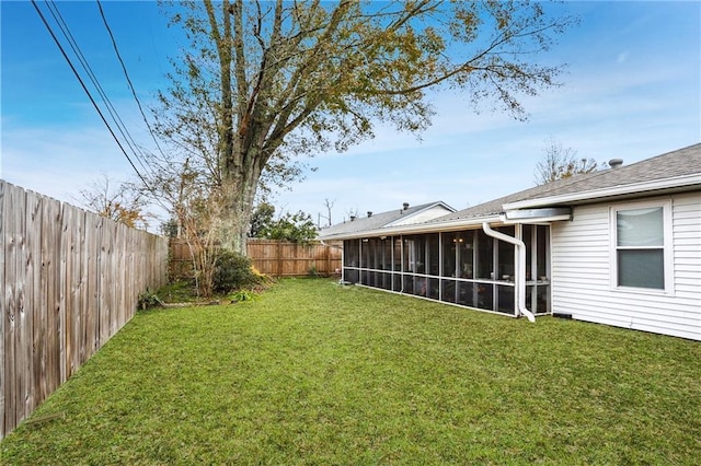 view of yard featuring a sunroom