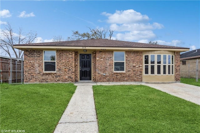 single story home with a front yard