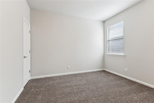 empty room with carpet flooring