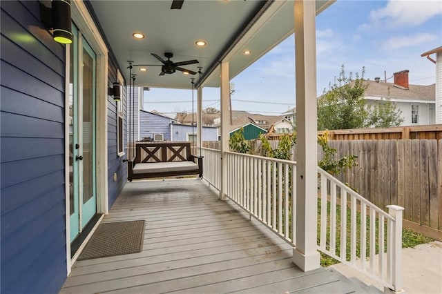2308 Amelia St, New Orleans, LA 70115 - wooden terrace with a residential view, fence, and a ceiling fan