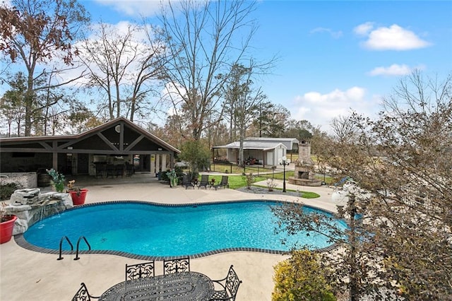 view of pool featuring a patio