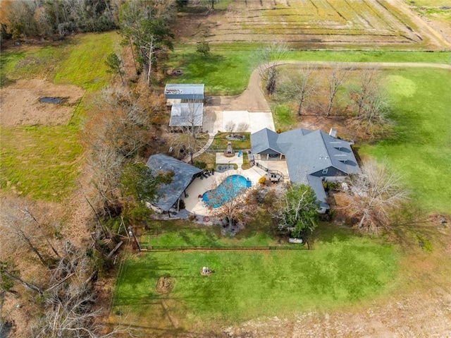 birds eye view of property with a rural view