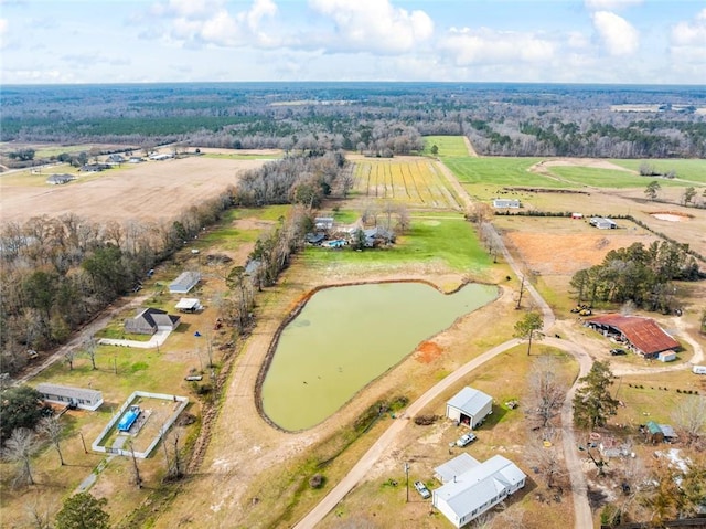 birds eye view of property with a water view and a rural view