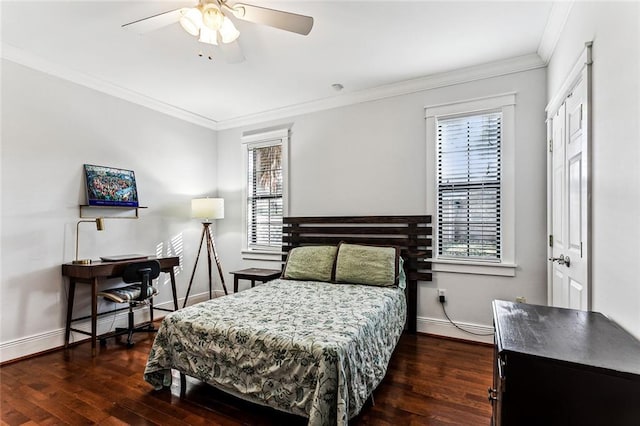 bedroom with ornamental molding, dark hardwood / wood-style flooring, and multiple windows