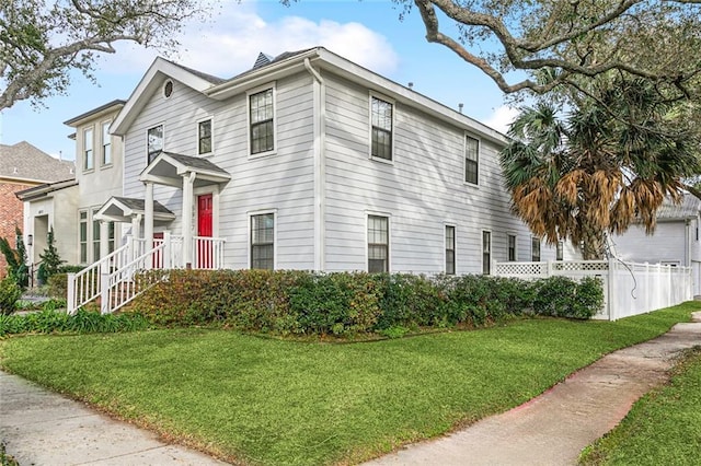 view of front facade with a front yard