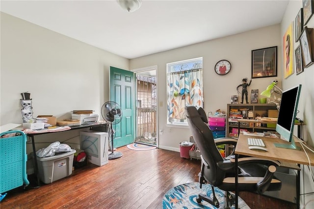 office space with dark hardwood / wood-style flooring