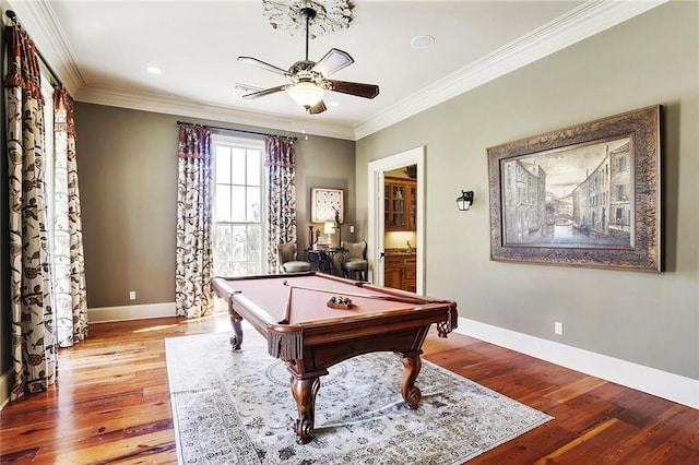 playroom with crown molding, light hardwood / wood-style flooring, ceiling fan, and billiards