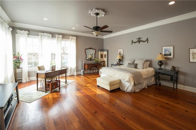 bedroom featuring ornamental molding, ceiling fan, and light wood-type flooring