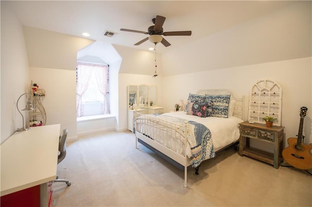 bedroom featuring lofted ceiling, ceiling fan, and carpet flooring