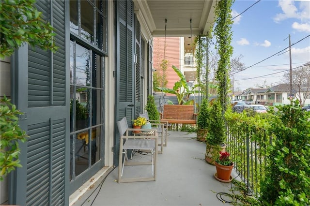 balcony featuring a porch