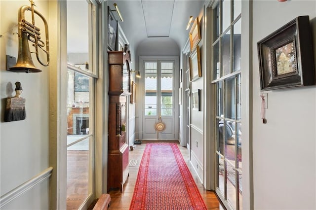 doorway featuring wood-type flooring