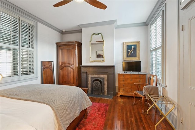 1013 Race St, New Orleans, LA 70130 - bedroom featuring dark wood-type flooring, ceiling fan, and ornamental molding