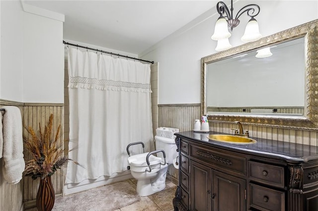 full bathroom featuring vanity, shower / bathtub combination with curtain, tile patterned floors, and toilet