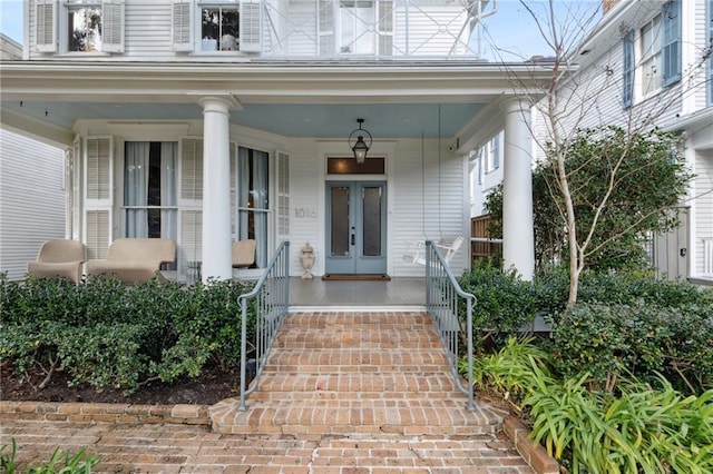 entrance to property featuring a porch