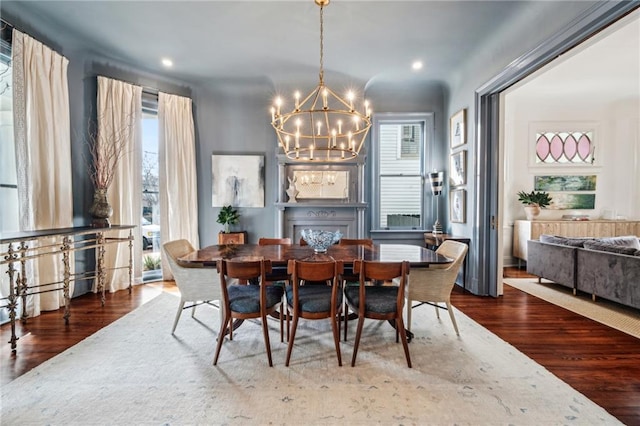 dining room featuring a notable chandelier and wood-type flooring