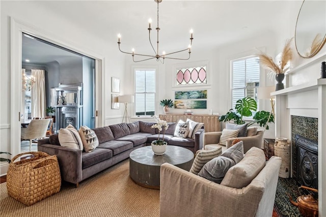 living room with a wealth of natural light and a chandelier