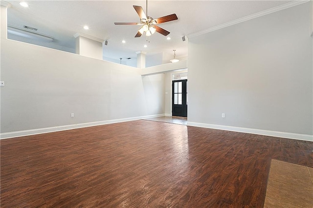 spare room with ceiling fan, ornamental molding, and dark hardwood / wood-style flooring