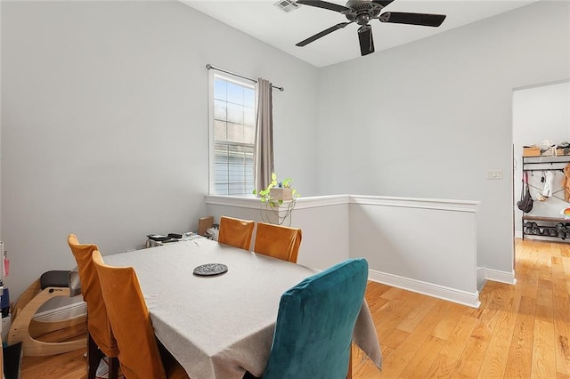 dining area featuring ceiling fan and light hardwood / wood-style flooring