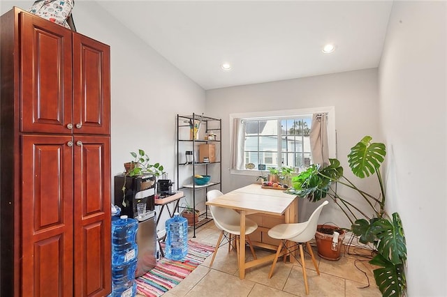 dining area featuring light tile patterned floors