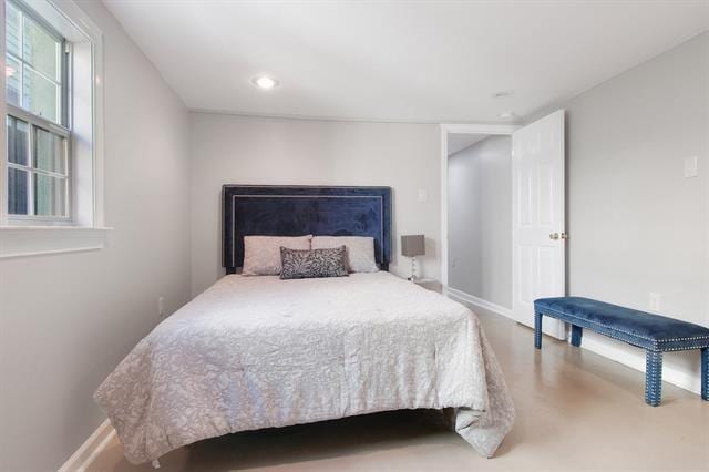 bedroom with concrete flooring