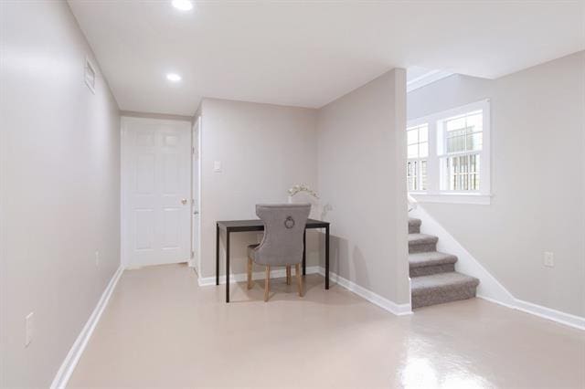 office area with concrete floors