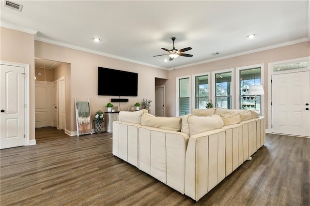 living room featuring ornamental molding, ceiling fan, and dark hardwood / wood-style flooring