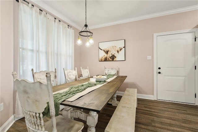 71078 Troy Spears Rd, Kentwood, LA 70444 - dining space featuring ornamental molding, baseboards, and wood finished floors