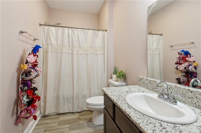71078 Troy Spears Rd, Kentwood, LA 70444 - full bathroom featuring toilet, vanity, and curtained shower