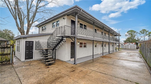 back of house with a patio