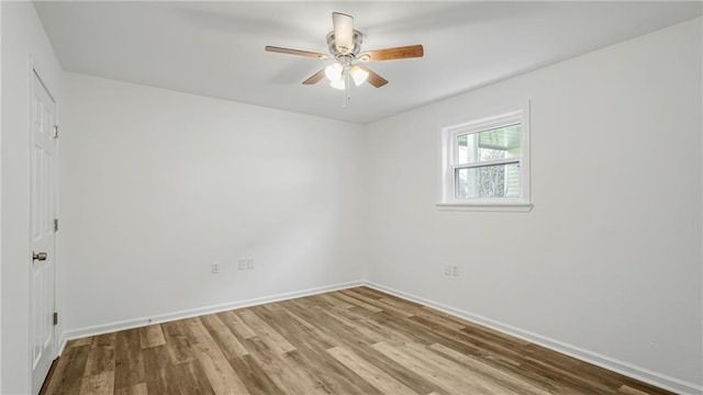 spare room with ceiling fan and light hardwood / wood-style flooring