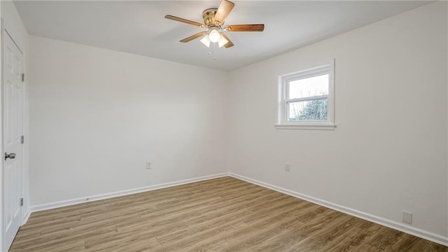 unfurnished room featuring ceiling fan and light hardwood / wood-style flooring