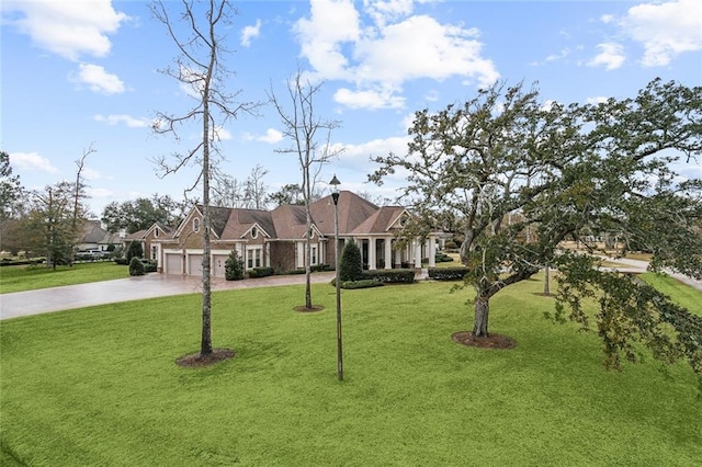 single story home with a garage and a front yard